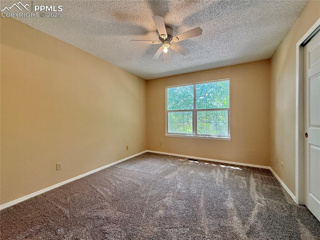 Image 13 of 23: 2nd bedroom, also with an ensuite bathroom.