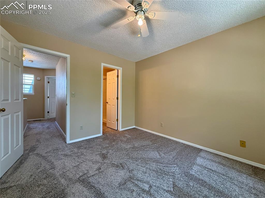 Image 14 of 23: 2nd bedroom, also with an ensuite bathroom.