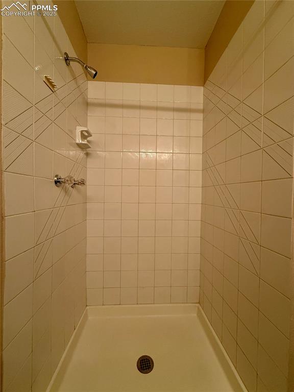Image 17 of 23: Stand up shower in the upstairs bathroom.