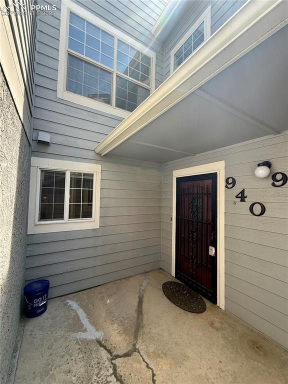 Image 2 of 23: A cozy front entrance to the two-story condo.