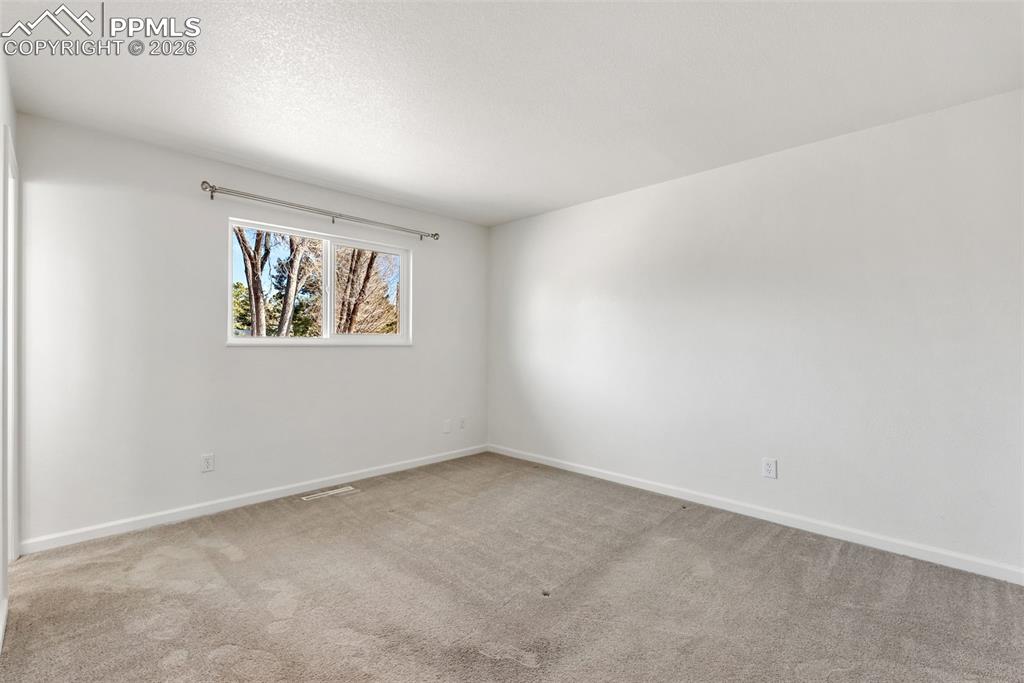 Image 33 of 50: Master Bedroom