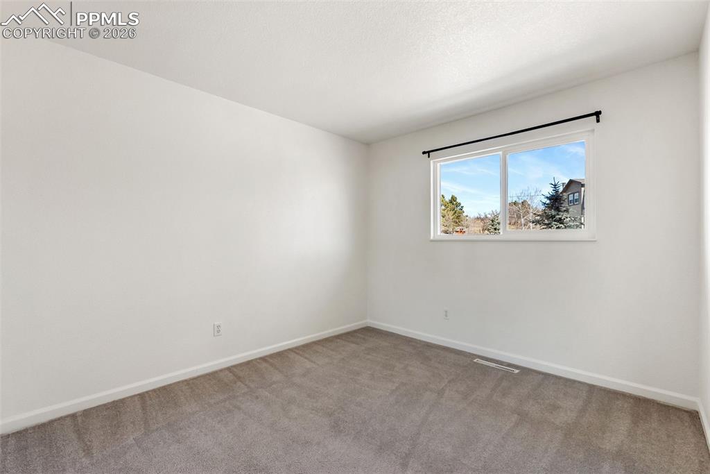 Image 40 of 50: Bedroom