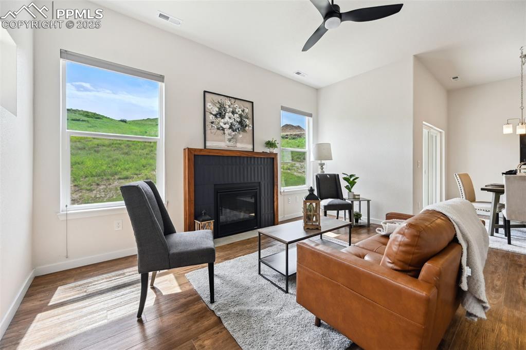 Image 14 of 30: Beautiful custom gas log fireplace in Living Room