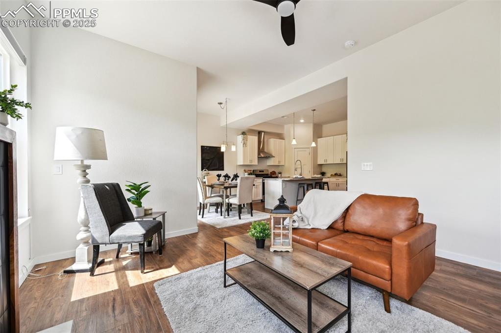 Image 15 of 30: The Living Room is located off the Kitchen and Dining Area.