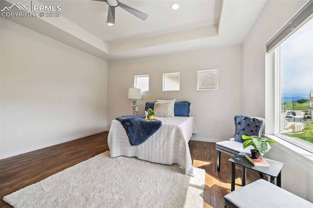Image 18 of 30: Tons of natural light in the upper level Primary Bedroom.