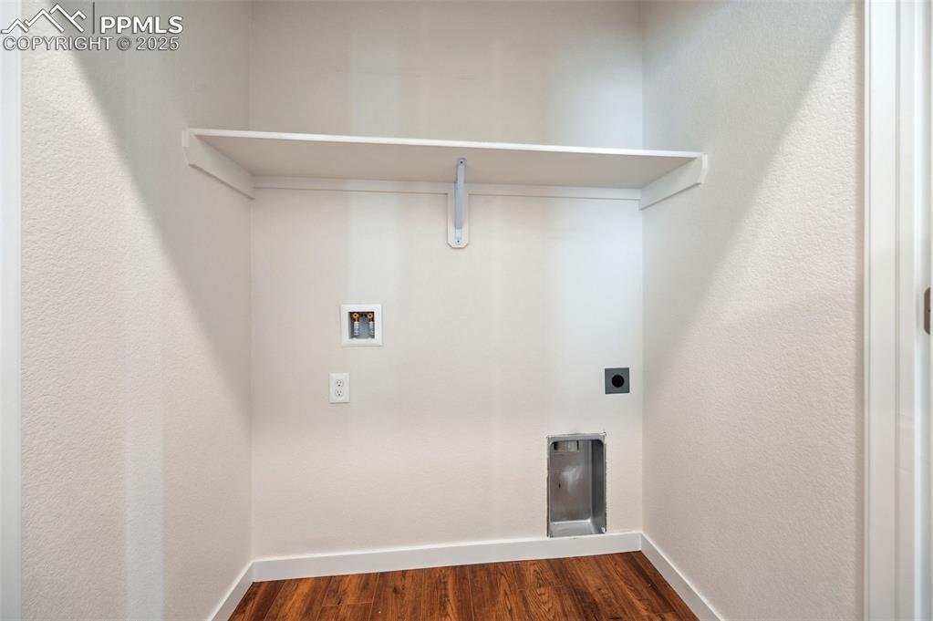 Image 24 of 30: Upper Level Laundry Room with electric hook up.