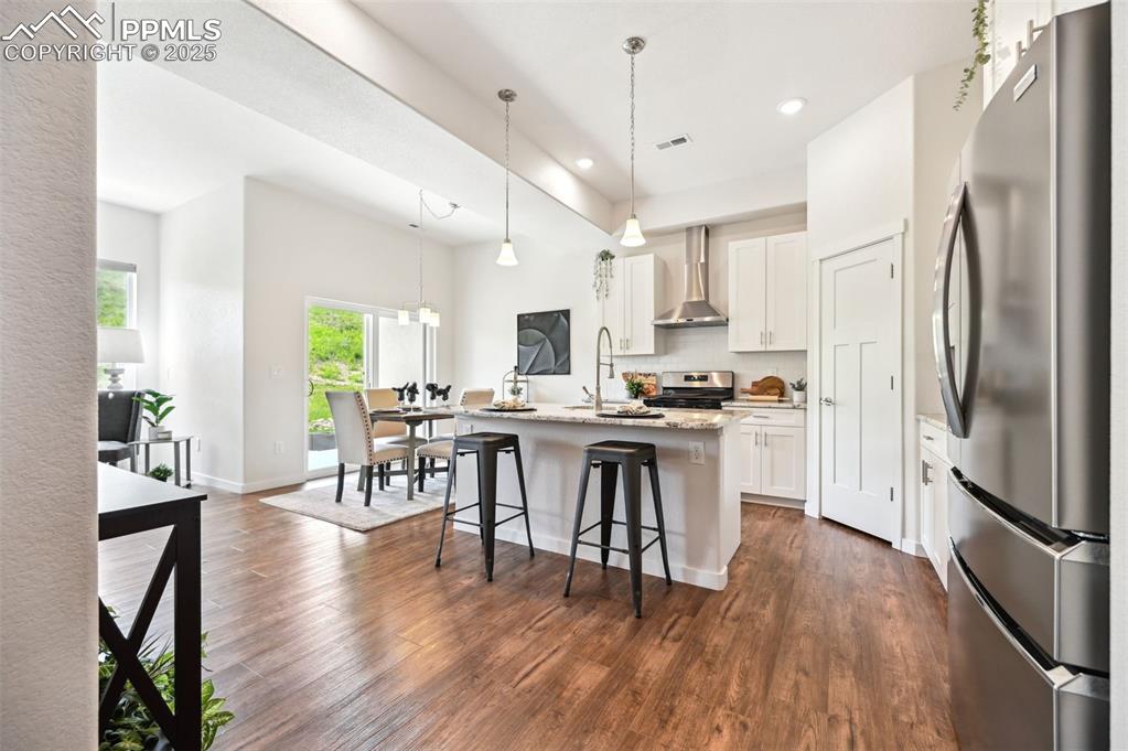 Image 5 of 30: View into the Kitchen from the Front Entry.