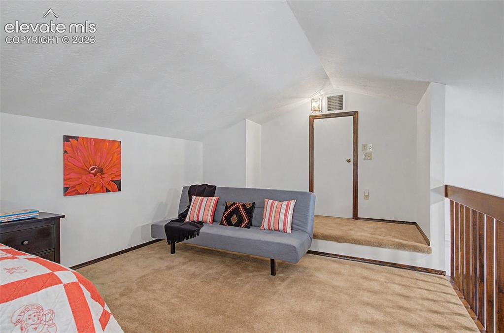 Image 29 of 50: Another view of the loft! Plenty of room for an extra bed or maybe a librar