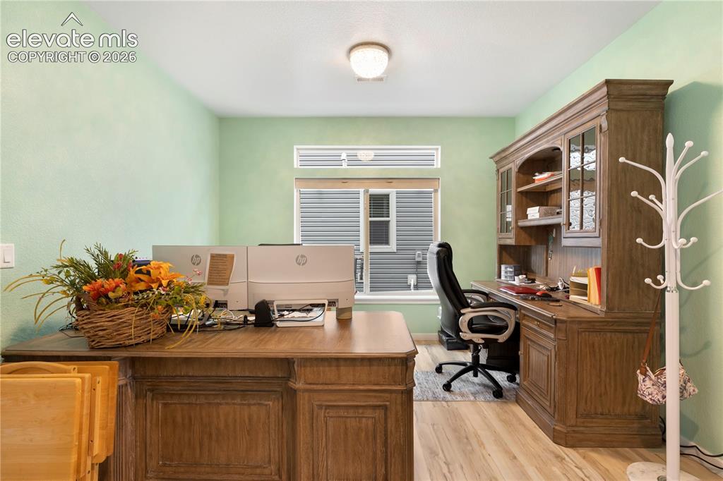Image 18 of 25: Flex room can be used as study, dining room. or tv room. Located on Main