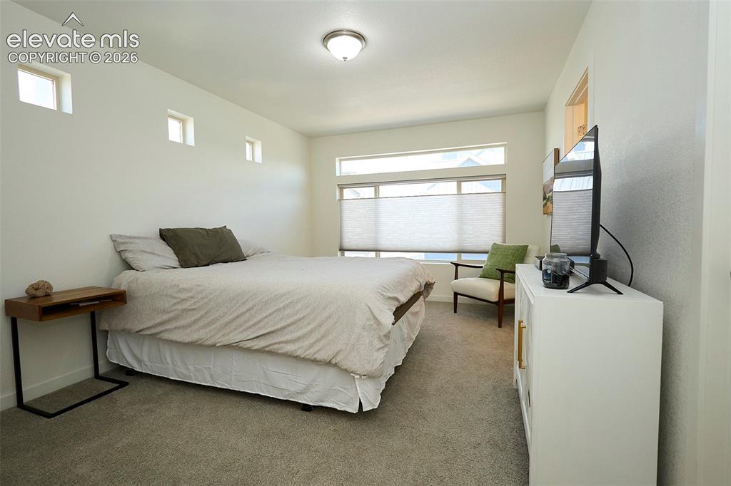Image 21 of 50: Master Bedroom