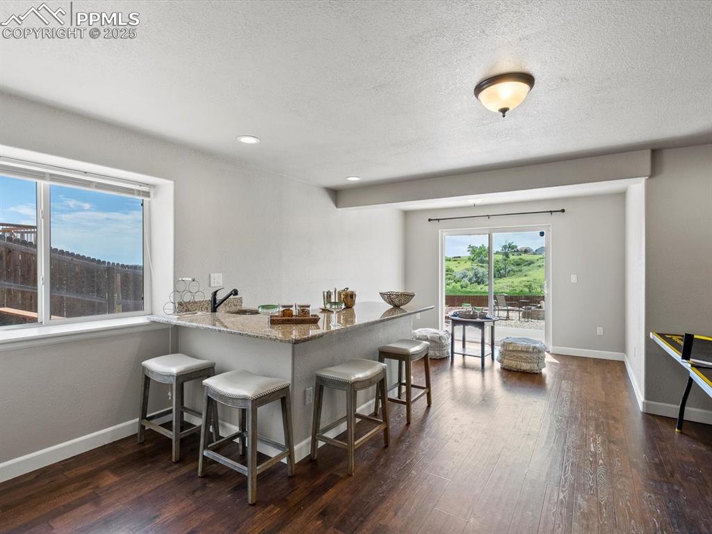 Image 34 of 50: Wet Bar/Game Room