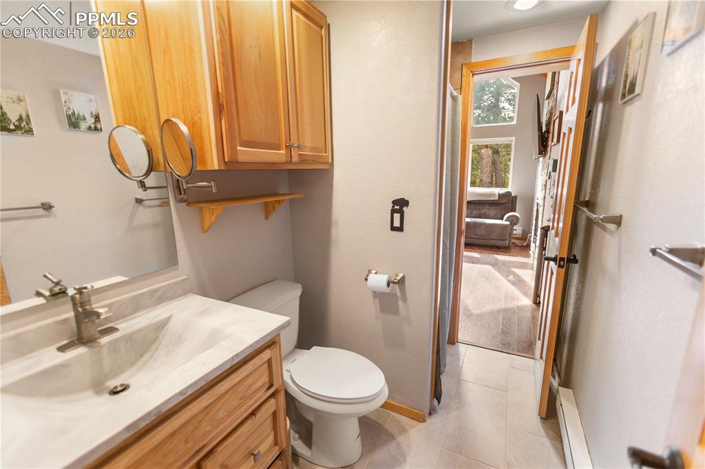 Image 10 of 27: Main Level Bath