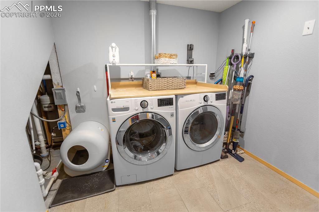 Image 18 of 27: Lower level Laundry
