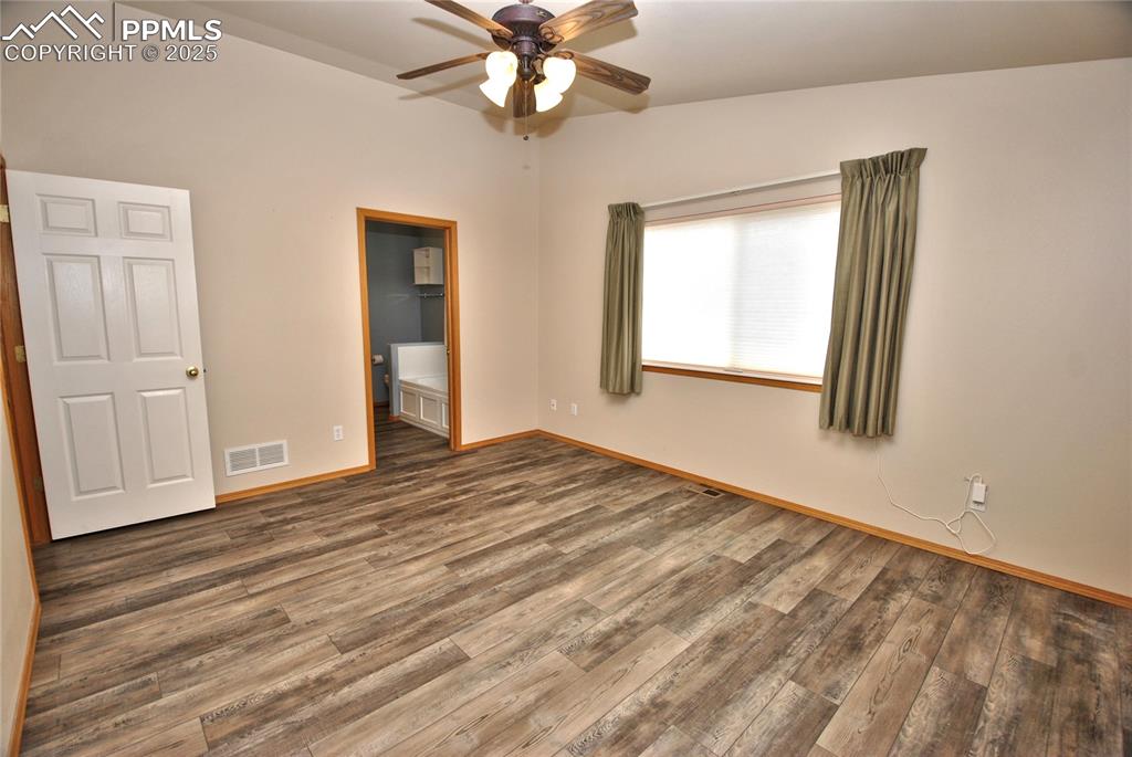 Image 13 of 32: Master Bedroom
