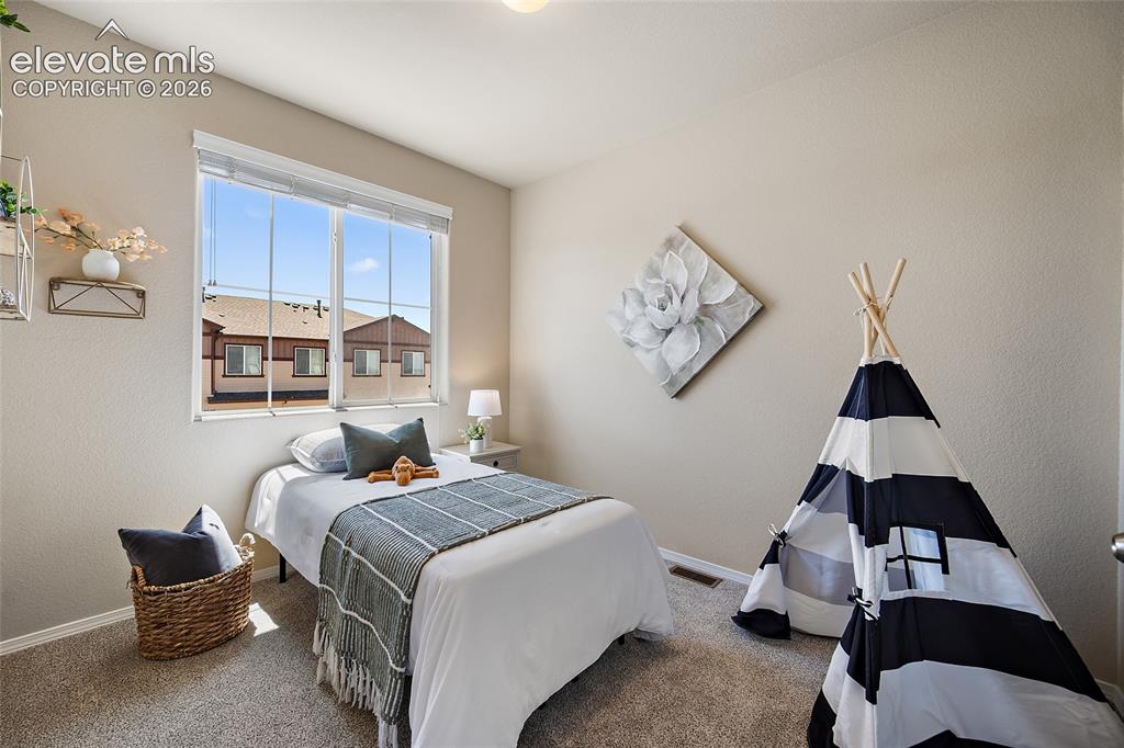 Image 15 of 29: Bedroom with Mountain Views