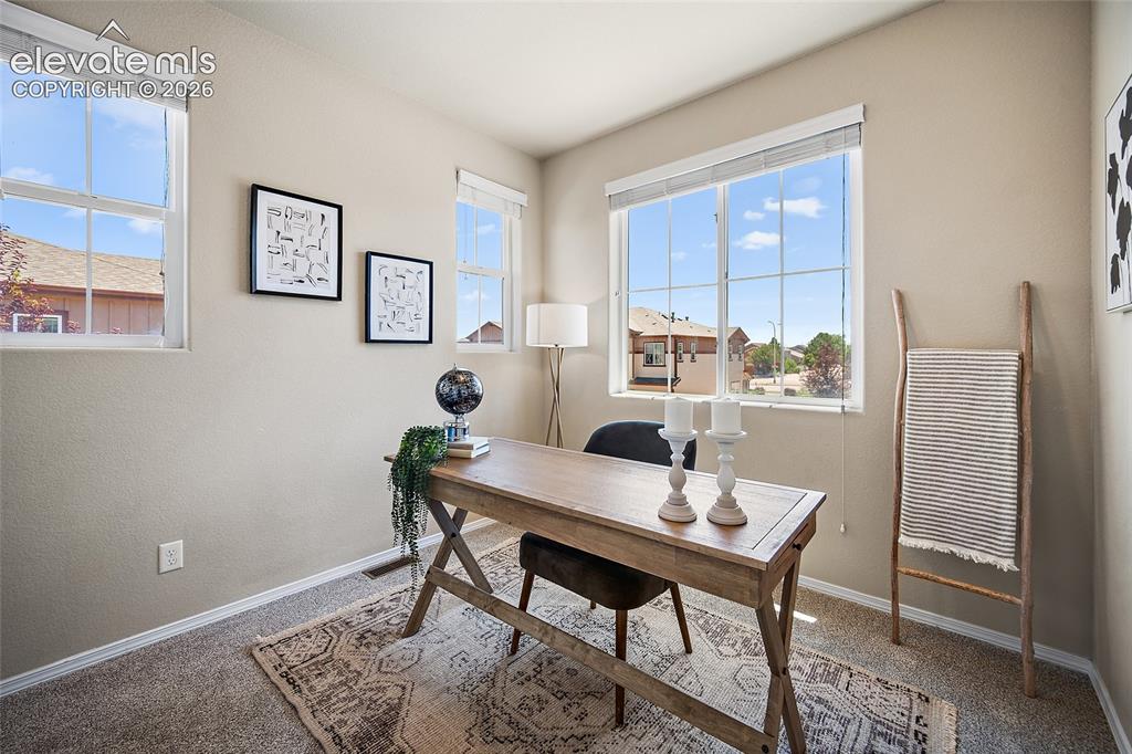 Image 16 of 29: Guest Bedroom or Office with City Views