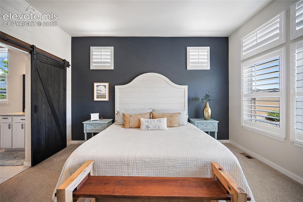 Image 12 of 42: Master Bedroom