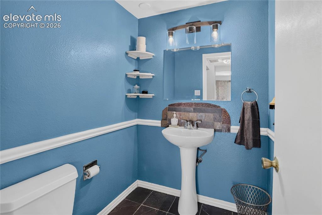 Image 11 of 23: Powder room - main level