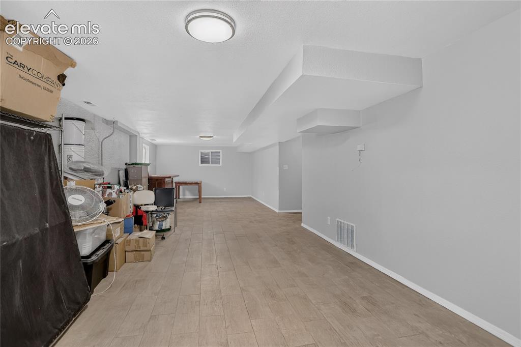 Image 17 of 23: Expansive rec room - lower level