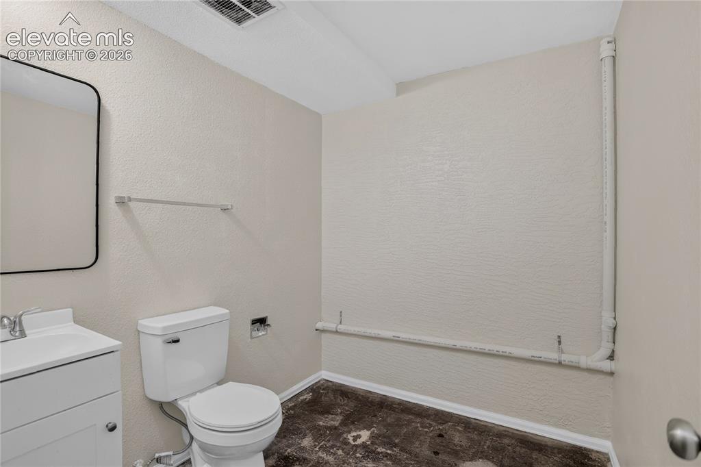Image 19 of 23: Lower level bathroom