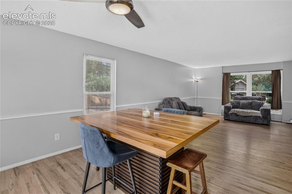 Image 4 of 23: Open flow from living to dining area