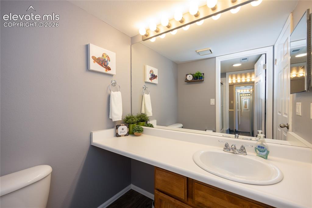 Image 15 of 25: Guest Bathroom shares the Shower/Tub room with the Primary Bathroom.