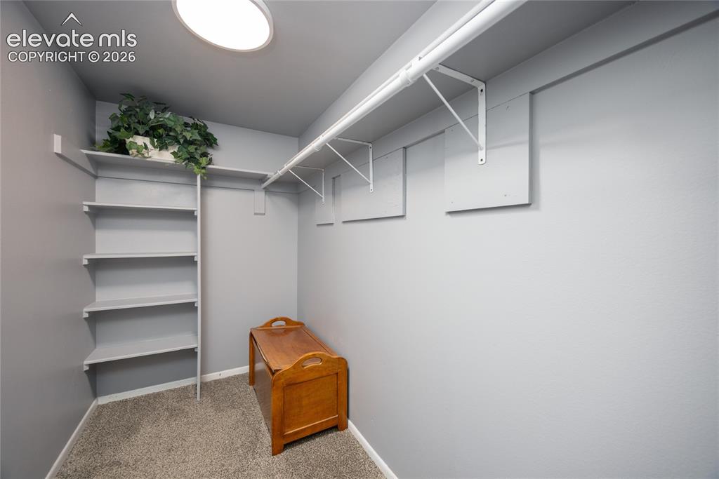 Image 8 of 25: Large Walk-In Closet