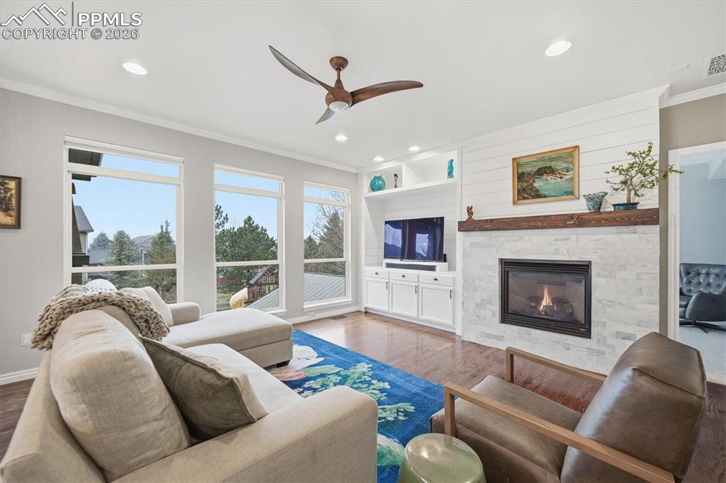 Image 15 of 50: Great Room w/ Fireplace and open to kitchen