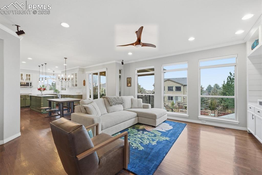 Image 16 of 50: Great Room w/ Fireplace and open to kitchen
