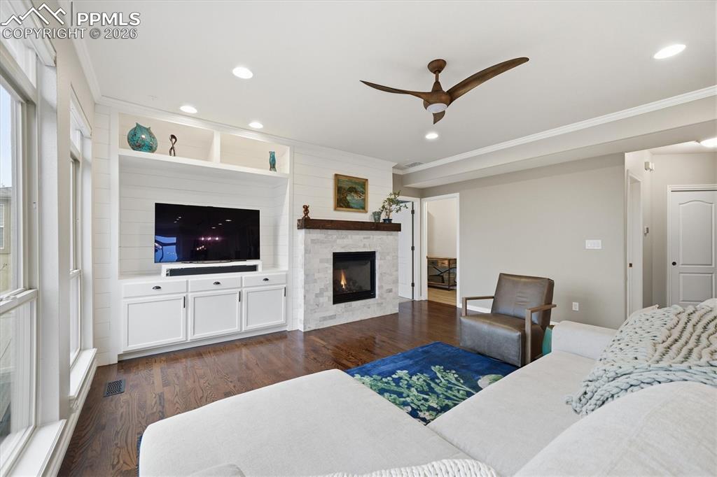 Image 17 of 50: Great Room w/ Fireplace and open to kitchen