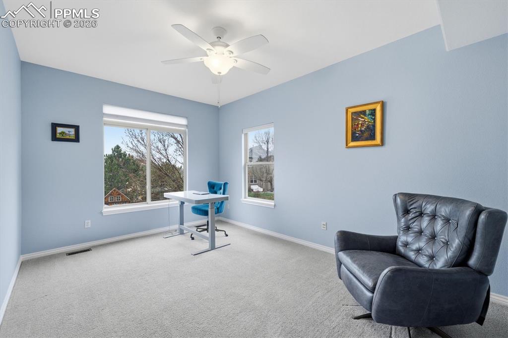 Image 19 of 50: Main level corner office