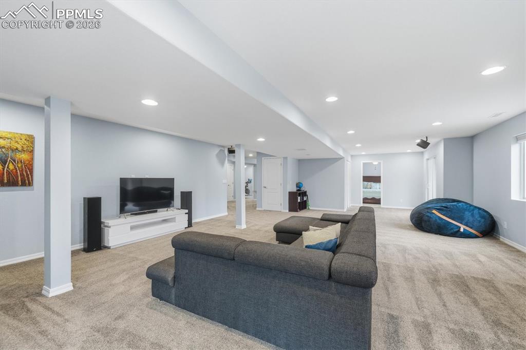 Image 33 of 50: Basement rec room- secondary living room