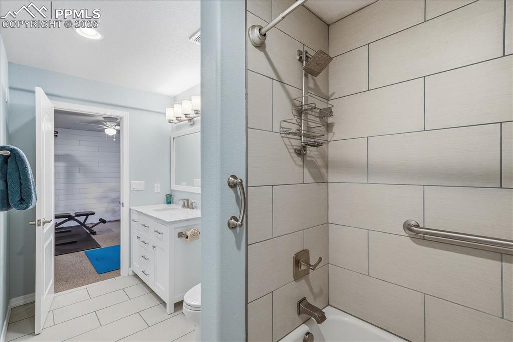 Image 38 of 50: Jack and Jill basement bathroom