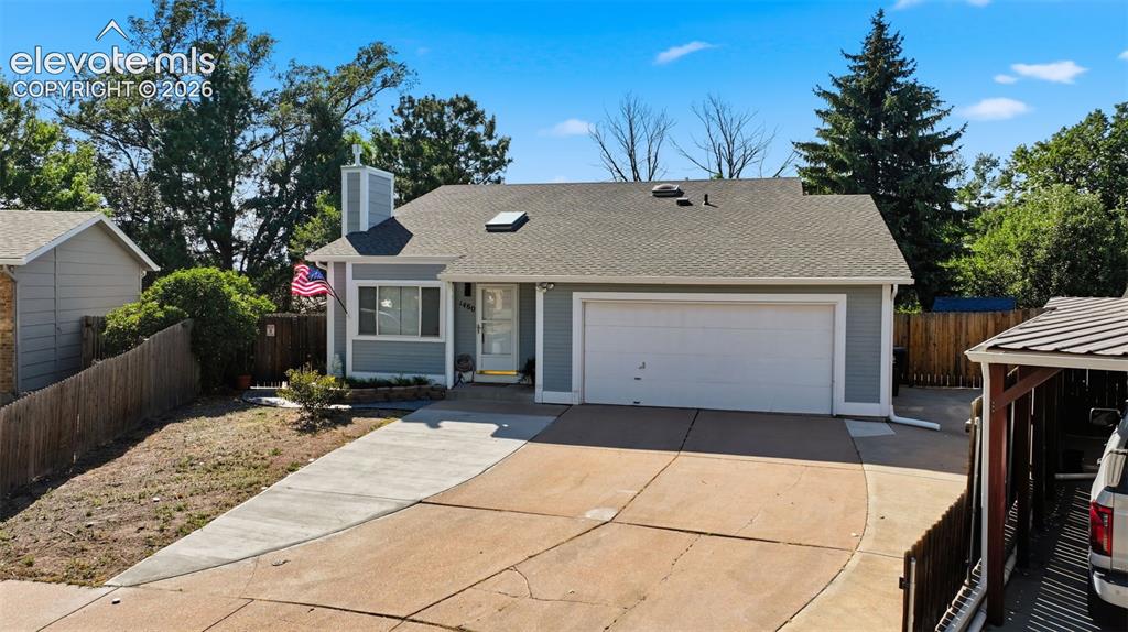 Image 2 of 29: Front of home New roof 6/2026 and fabulous Lilac bush on the left side by t