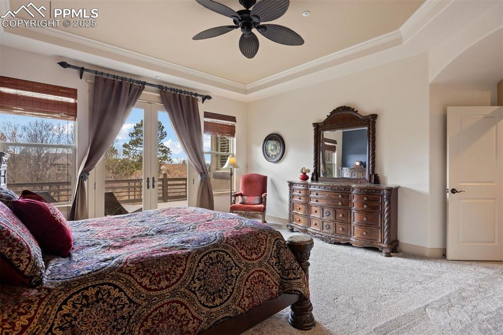 Image 21 of 50: Bedroom featuring ornamental molding, access to outside, french doors, carp