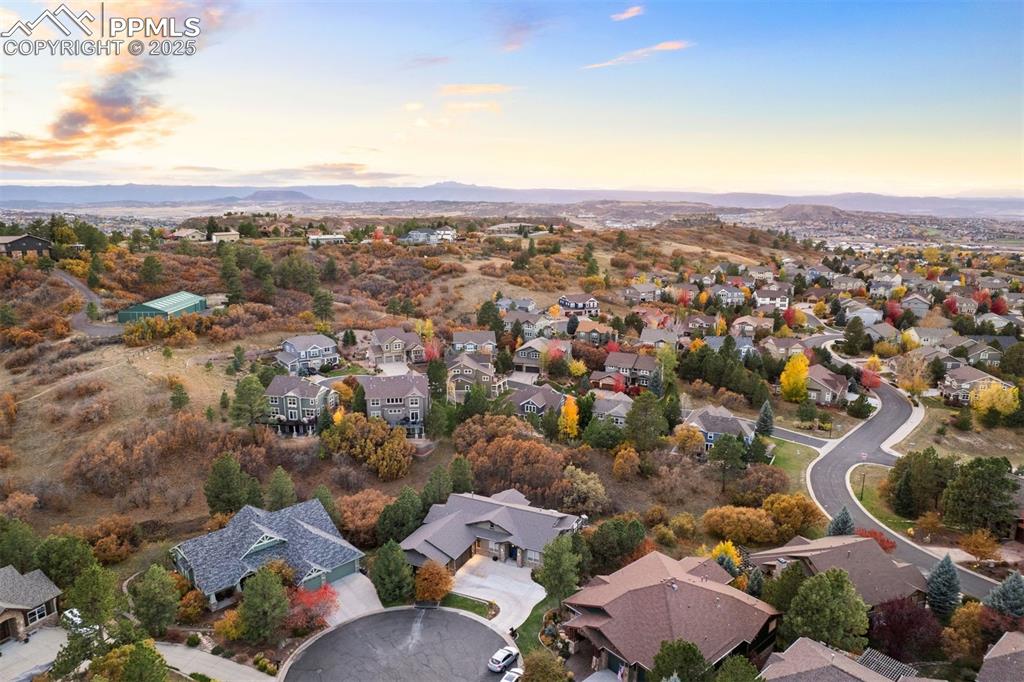 Image 50 of 50: Aerial view of property and surrounding area with nearby suburban area and 