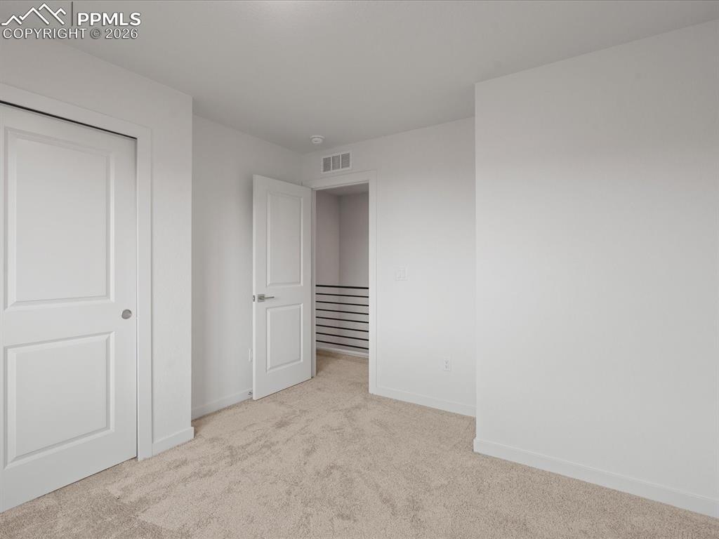 Image 20 of 25: Bedroom