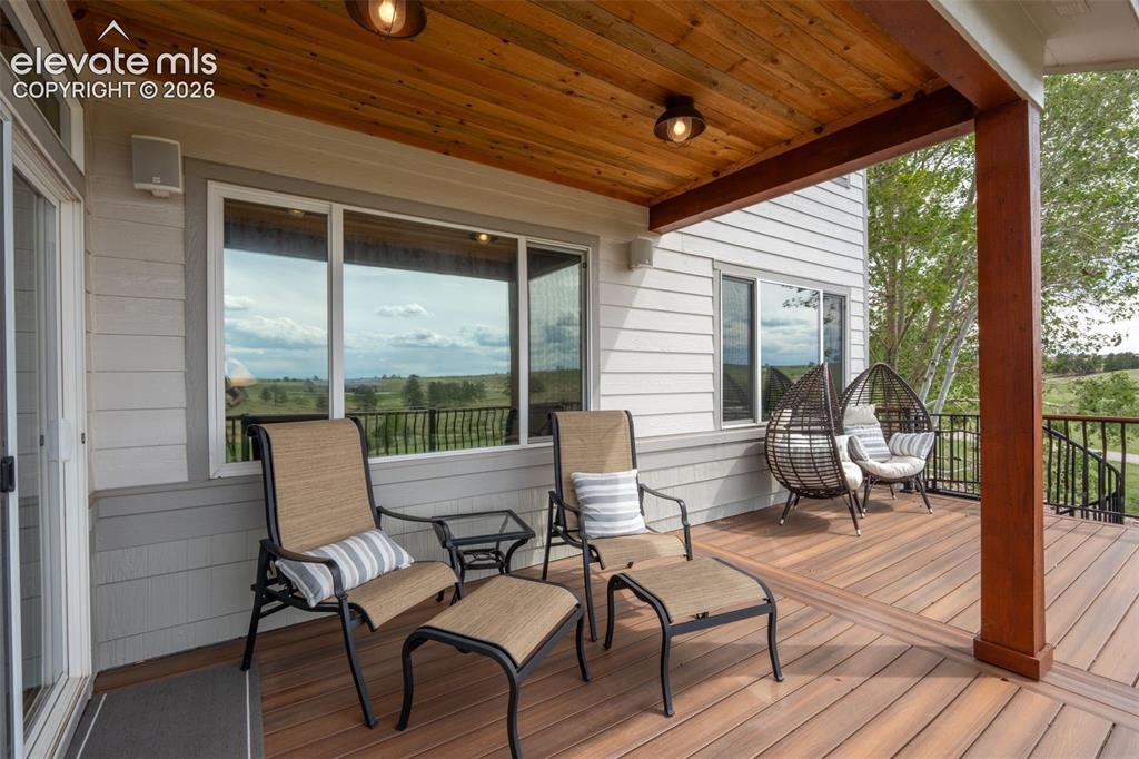 Image 10 of 50: UPPER PATIO WITH SPIRAL STAIRCASE