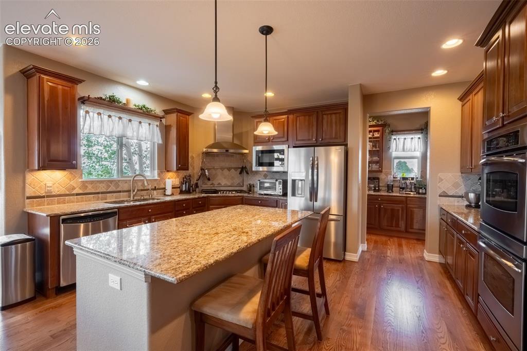 Image 21 of 50: KITCHEN ISLAND GRANITE COUNTERS