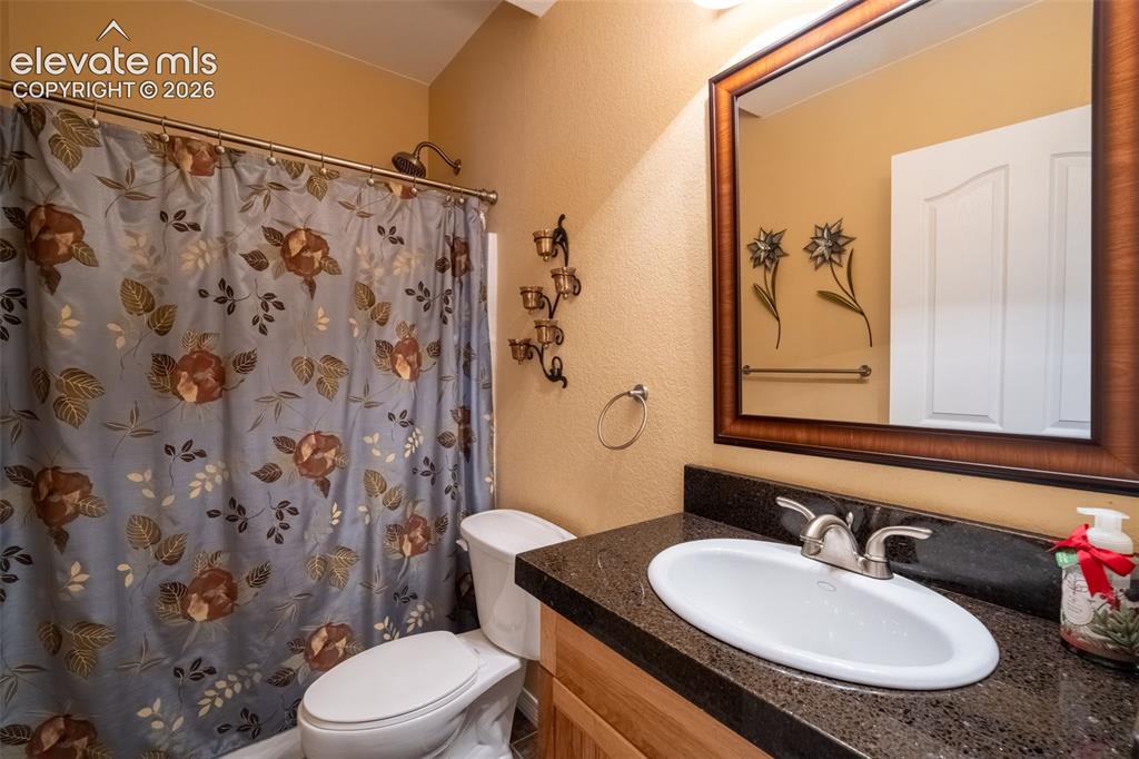 Image 48 of 50: BASEMENT BATHROOM