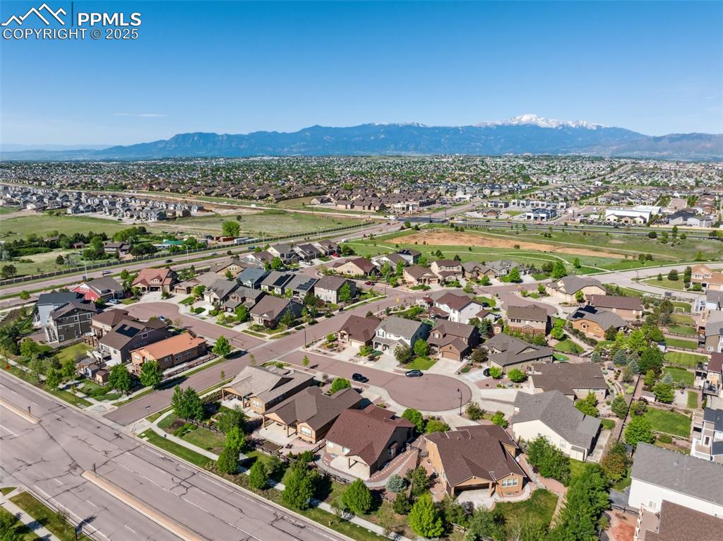Image 48 of 50: View of property location featuring a mountainous background and nearby sub