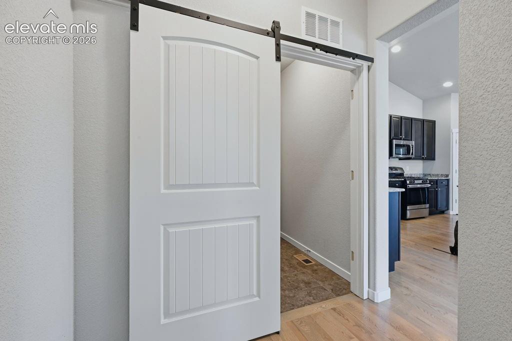 Image 19 of 40: Entrance to laundry and garage