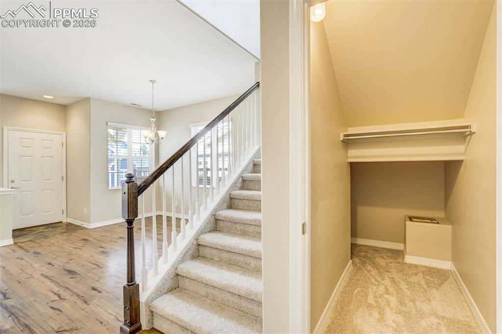Image 17 of 35: Staircase and under stair storage