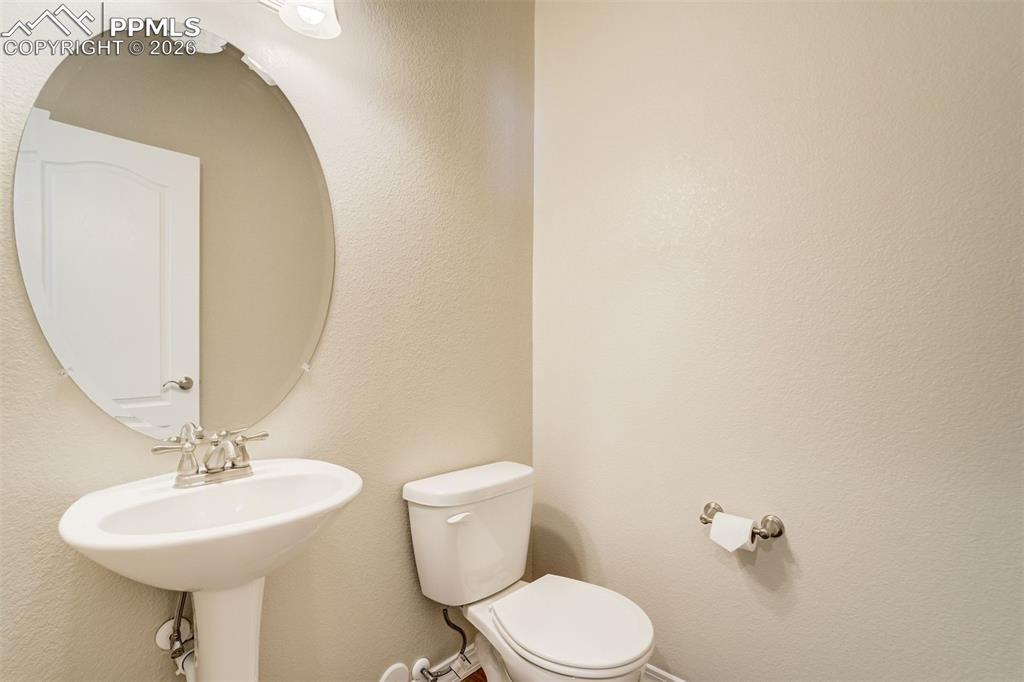 Image 18 of 35: Main level powder room