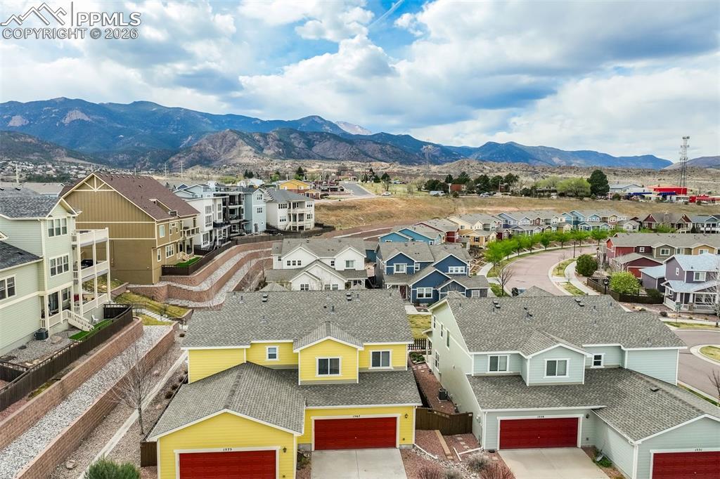 Image 3 of 35: Aerial perspective of Goldhill Mesa featuring mountains