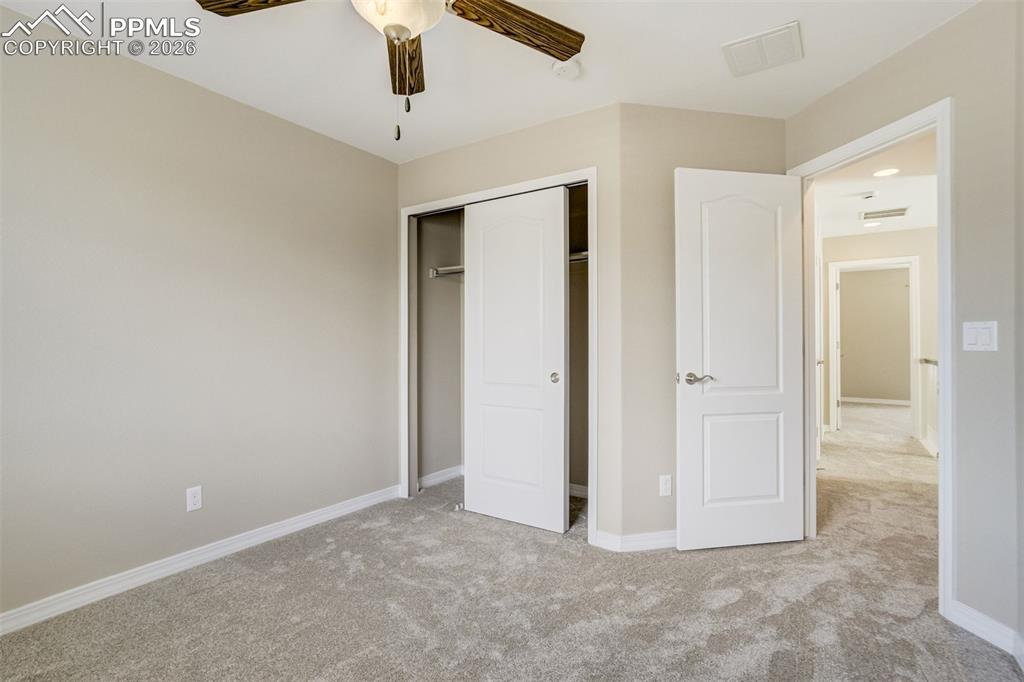 Image 32 of 35: Bedroom 3 with spacious closet and brand new carpet and padding.