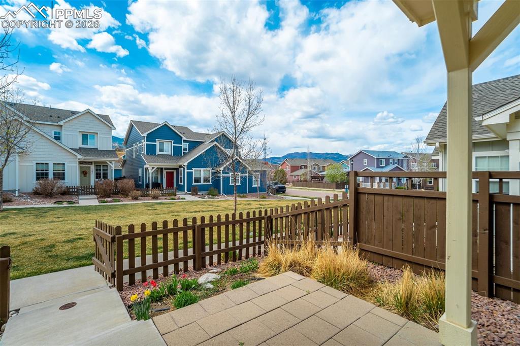 Image 6 of 35: View of grassy open space right out the front door