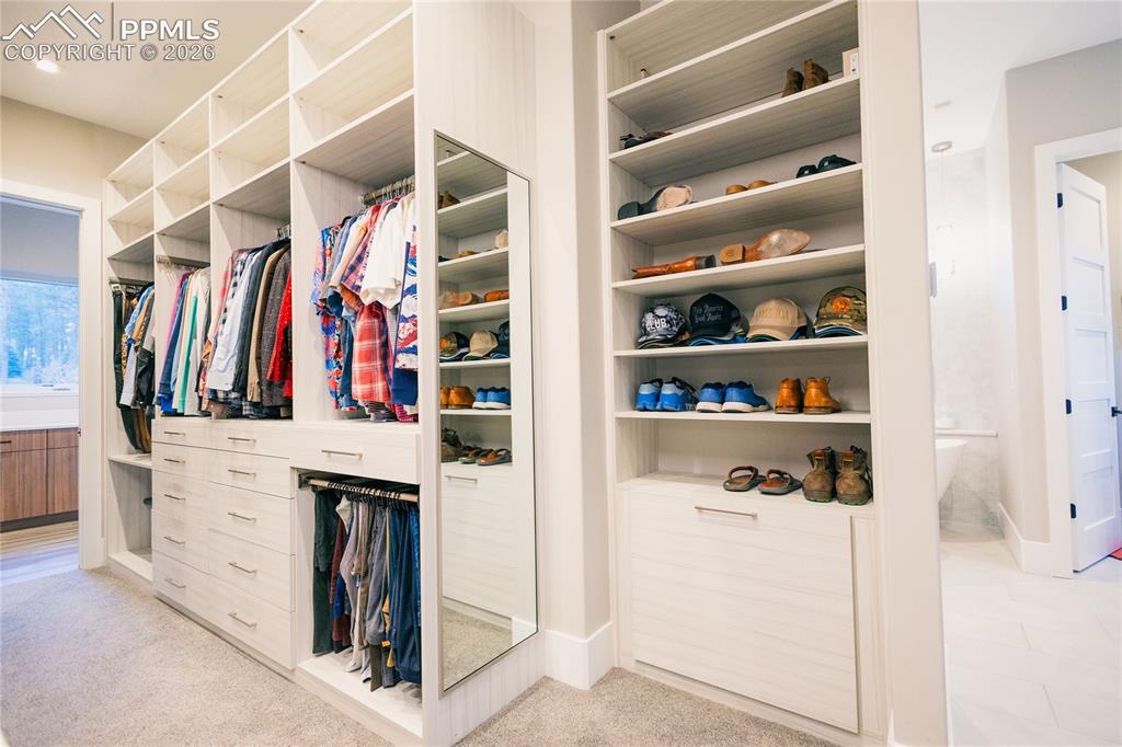 Image 20 of 49: Walk in closet