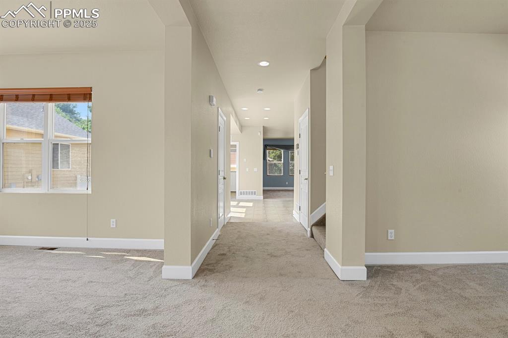 Image 8 of 35: Corridor featuring carpet floors and recessed lighting