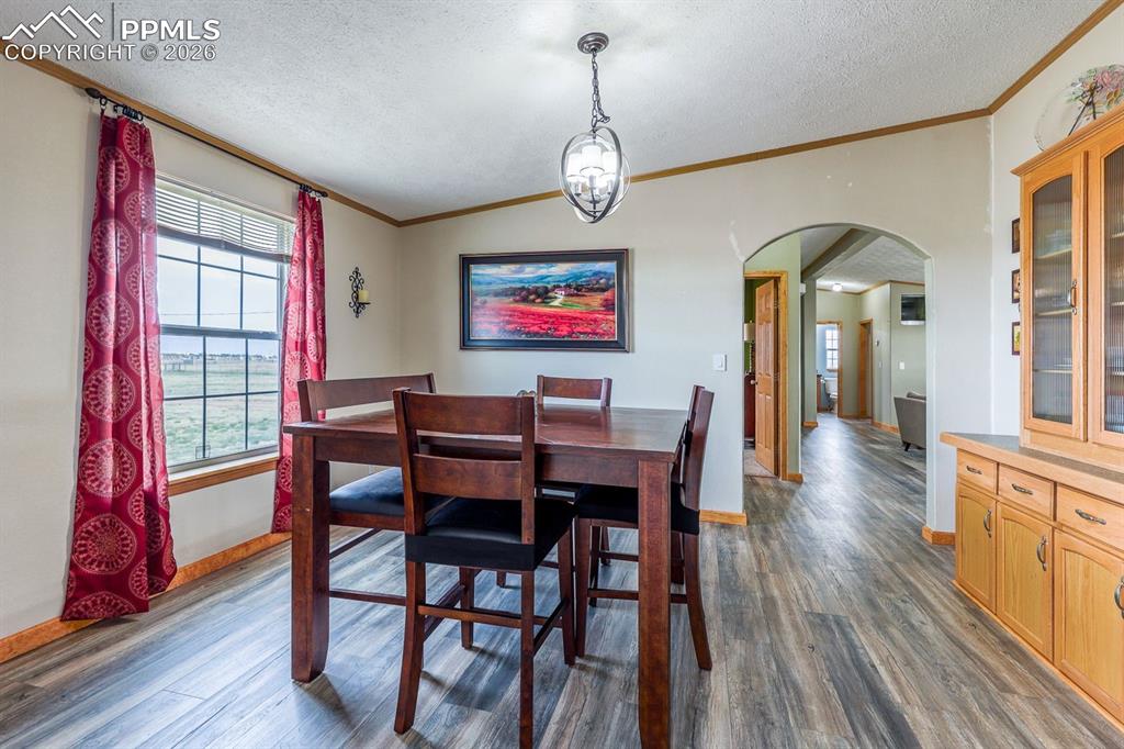 Image 11 of 39: Dining Room with Hutch
